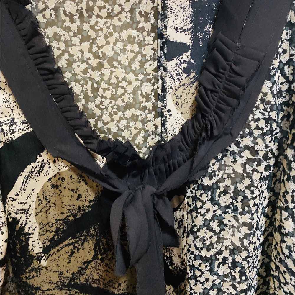 Sleeveless blouse size L